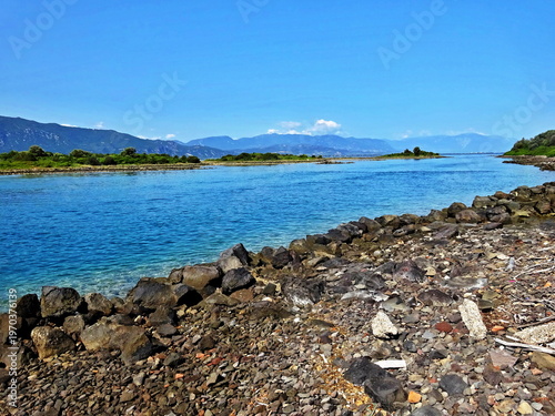 Greece - view on the coast of Monolia island near  the town of Kamena Vourla on the mainland