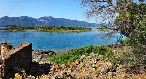 Greece - view on the coast of Monolia island near  the town of Kamena Vourla on the mainland