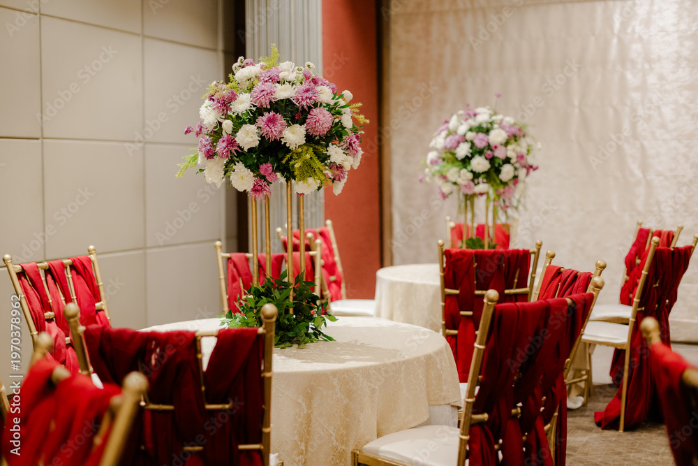 custom made wallpaper toronto digitalElegant Reception Decor with Floral Centerpieces and Red Velour Chairs, Perfect for Weddings, Parties, and Special Events
