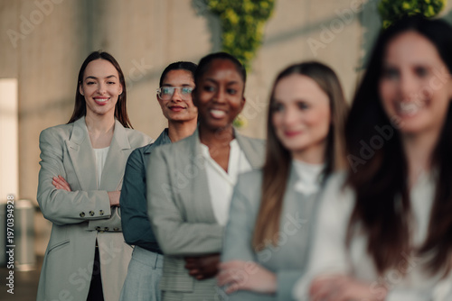 Fotografi Diverse businesswomen lining up smiling, showing leadership, empowerment, and su