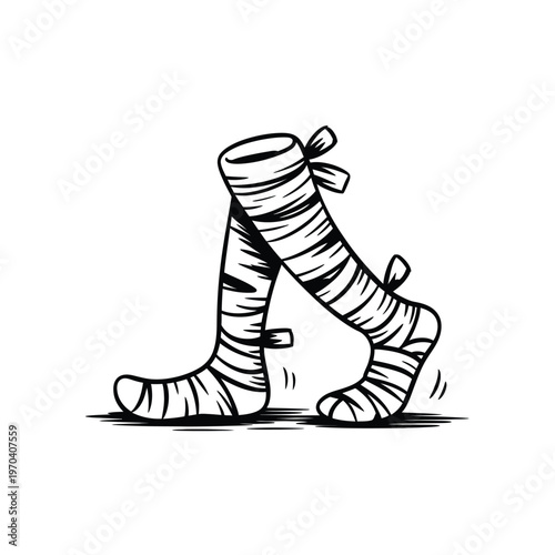 Wrapped mummy legs standing on ground in black and white illustration