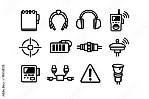 Set of black and white technology and communication icons including headphones walkie talkie battery and warning sign on white background