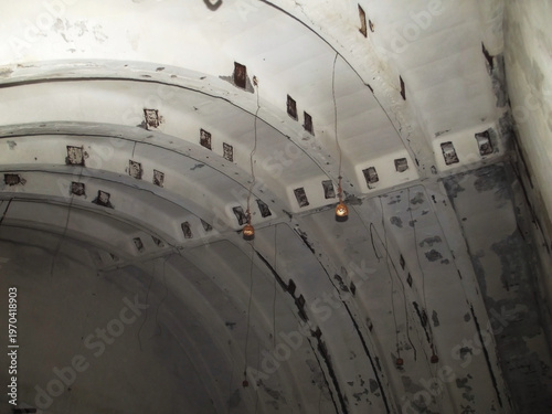 Vaulted concrete ceiling in a large industrial warehouse
