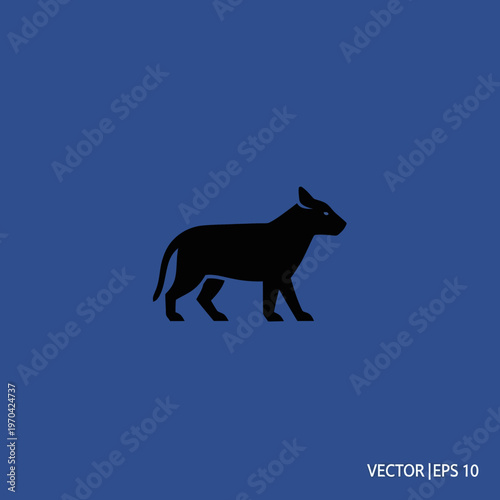 Silhouette of a Black Bull Standing on a Blue Background.