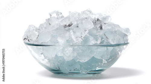 Crushed ice cubes in glass bowl isolated on clean white background, fresh frozen texture detail