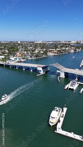 Boats passing through Las Olas Blvd drawbridge at Fort Lauderdale Beach in Broward County, Florida. 