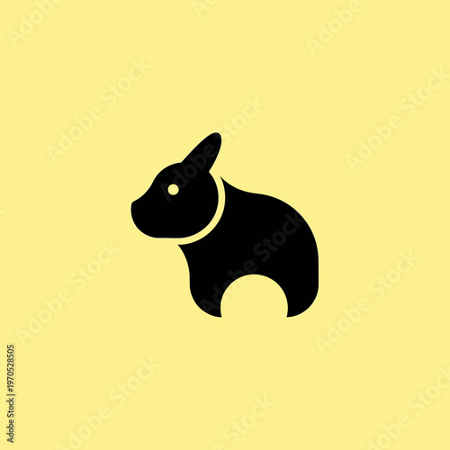Minimalist Black Rabbit Silhouette on Yellow Background.