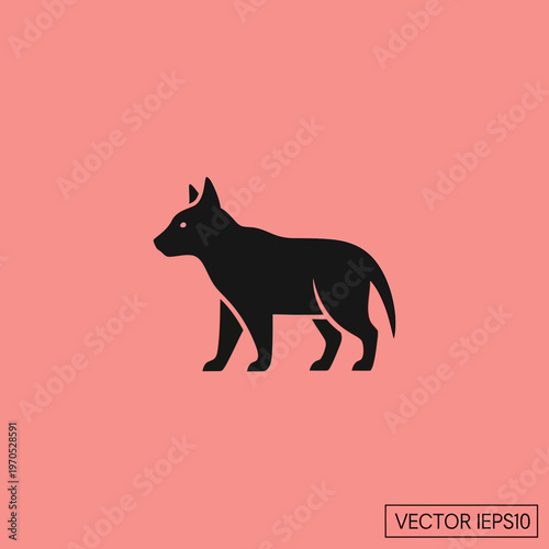 Silhouette of a standing dog with alert ears and tail.