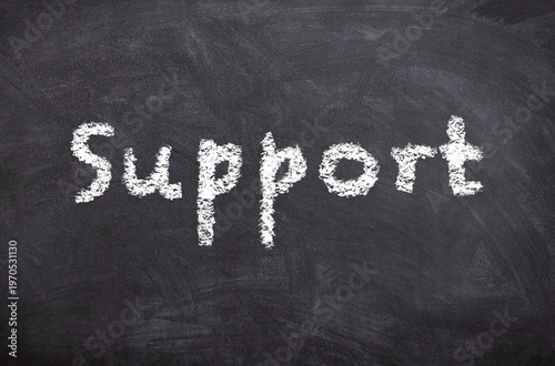Hand drawn chalk sketch on blackboard with the text Support symbolizing help assistance and life support