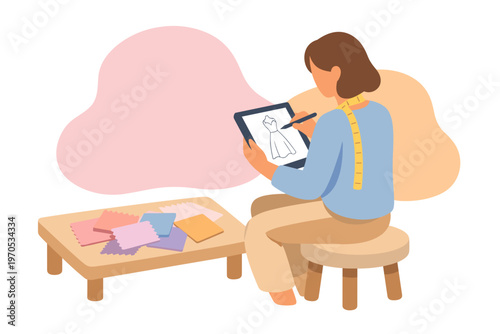 Fashion Designer Sketching Dress on Digital Tablet