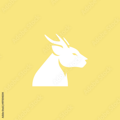 Minimalist White Deer Head Silhouette on Yellow Background.