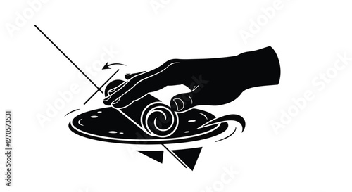 Hand rolling a cigarette on a circular surface with abstract shapes below.