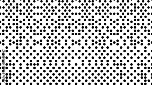 Black halftone dot pattern creating optical gradient effect.