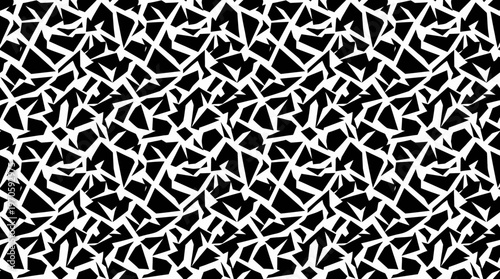 High-contrast black and white abstract geometric mosaic pattern.