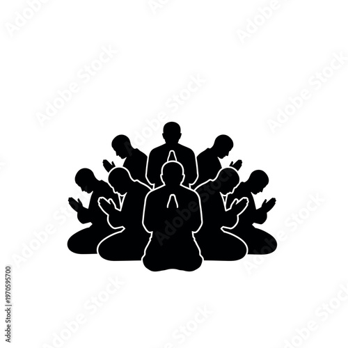 Group of people praying in unison.