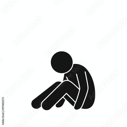 Minimalist silhouette of a lonely person sitting on the ground with a hunched posture representing depression