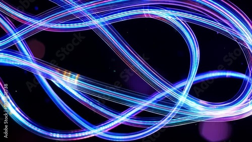 Abstract swirling blue and pink light trails on a dark background