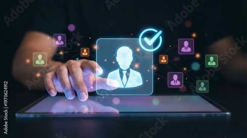A human hand gently taps a glowing translucent screen, highlighting a verified user profile icon surrounded by numerous other digital avatar representations, symbolizing identity management.