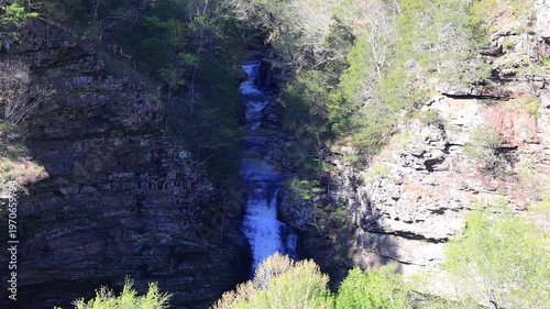 Wallpaper Mural Waterfall cascading down rocky cliffside in forest. Torontodigital.ca