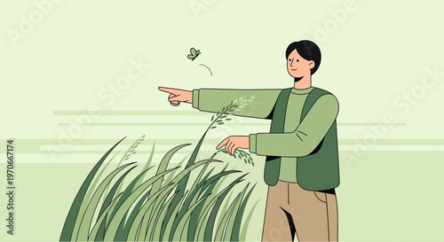 Young Man In Field Pointing To Butterfly Observing Nature