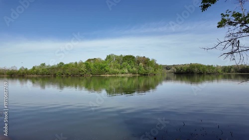 Wallpaper Mural Serene river with green trees and blue sky. Torontodigital.ca