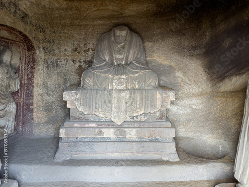 Statue of Taoist priest Song Defang in Piyun Niche (Niche no. 6) at Longshan Grottoes on Longshan (Mount Long ), established by Song Defang in Yuan Dynasty, Taiyuan, Shanxi, China. National heritage.