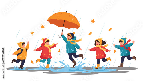 Five joyous children in raincoats and hats splash in puddles under an orange umbrella while autumn leaves fall, embracing the rainy season.
