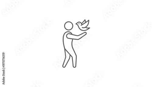 Person releasing a bird, symbolizing freedom, hope, and new beginnings