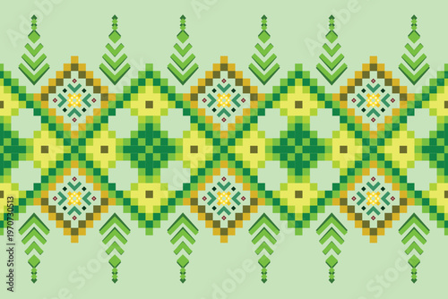 A decorative pixel art border featuring green and yellow geometric motifs. The design combines diamond shapes with stylized arrowhead or pine tree symbols.