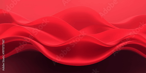 Luxurious red silk fabric creates a soft flowing wave texture with smooth curves and light patterns for a high-end abstract textile backdrop