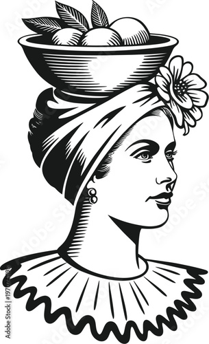 Woman in turban carrying fruit bowl on head