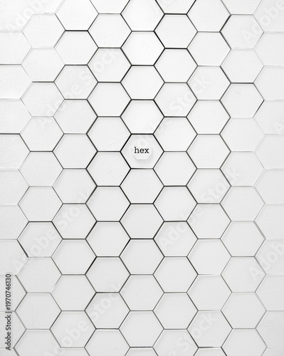 A simple black and white graphical representation of a honeycomb pattern with a single hex label. isolated on white background