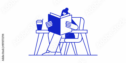 A person deeply engrossed in reading a book at a table