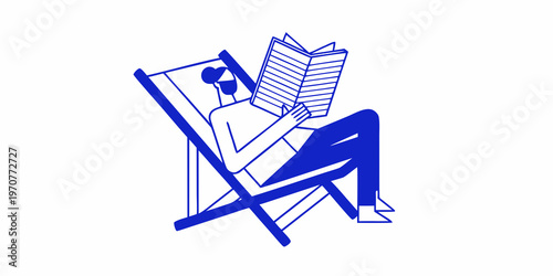 A person relaxes on a beach chair deeply engrossed in reading a book
