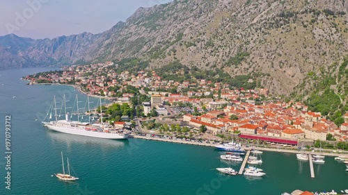 Aerial drone view of Kotor Old Town Stari Grad in Montenegro. UNESCO heritage ancient city. European travel holiday.