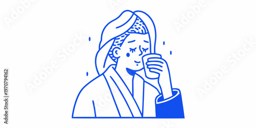 A sad woman in traditional attire covering her face with her hand