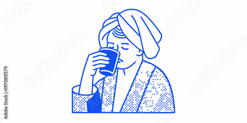 Woman enjoying a morning beverage with a towel wrapped around her hair
