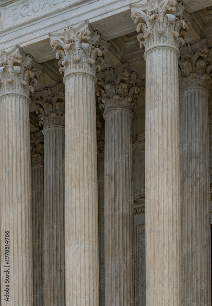 Fototapeta premium Columns Tall vertical texture background. Columns marble repetition symmetry. Columns architectural pattern design. Columns stone classical texture.