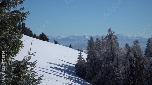 Distant view of Tatra Mountains from snowy Beskid Zywiecki mountains in Poland.