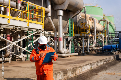 Industrial engineer Inspecting multi effect desalination equipment for purifying sea water