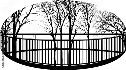 Silhouette of a circular fence around trees inside an oval frame. Branches reach across the top