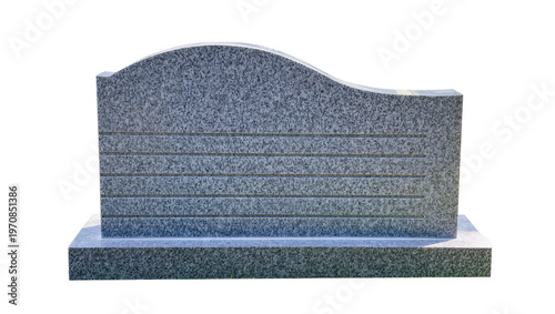 Fotografija Polished gray granite headstone with carved horizontal lines, resting on a squar