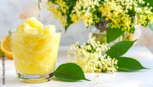 A refreshing glass of yellow slushy drink