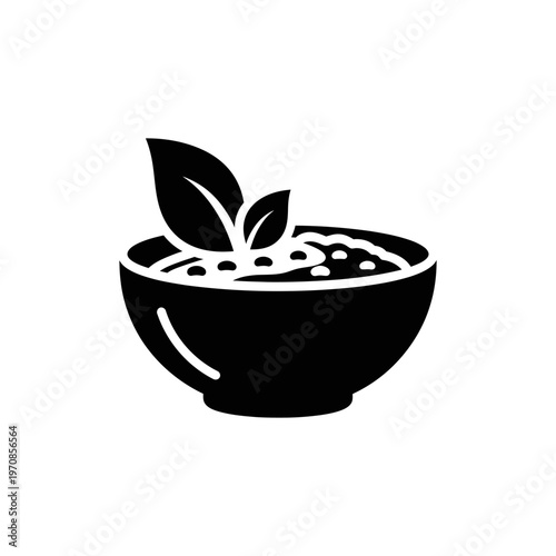 Black and White Icon of a Bowl with Leaves and Seeds