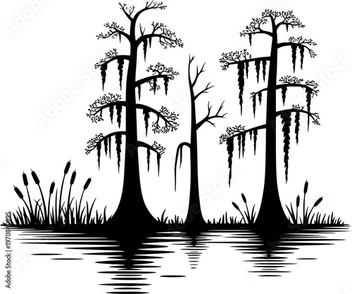 Black silhouette of cypress trees with Spanish moss over water and cattails swamp