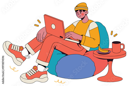 Man working on laptop on beanbag chair with coffee and banana snack.