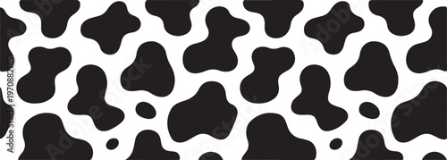 Black and white cow skin seamless pattern with irregular spots on transparent background for fabric print and animal hide texture.