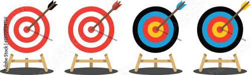 Four archery targets with arrows representing accuracy and success in sports and competition goals aiming for bullseye hit.