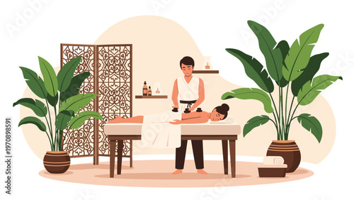 Relaxed woman receives a traditional hot stone massage treatment from a therapist in a peaceful spa environment.