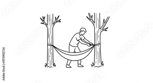Man setting up a hammock outdoors.